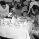 Aung San Suu Kyi, left, eats ice cream with her brother as Lord Louis Mountbatten, governor general of India, and his wife Edwina look on.